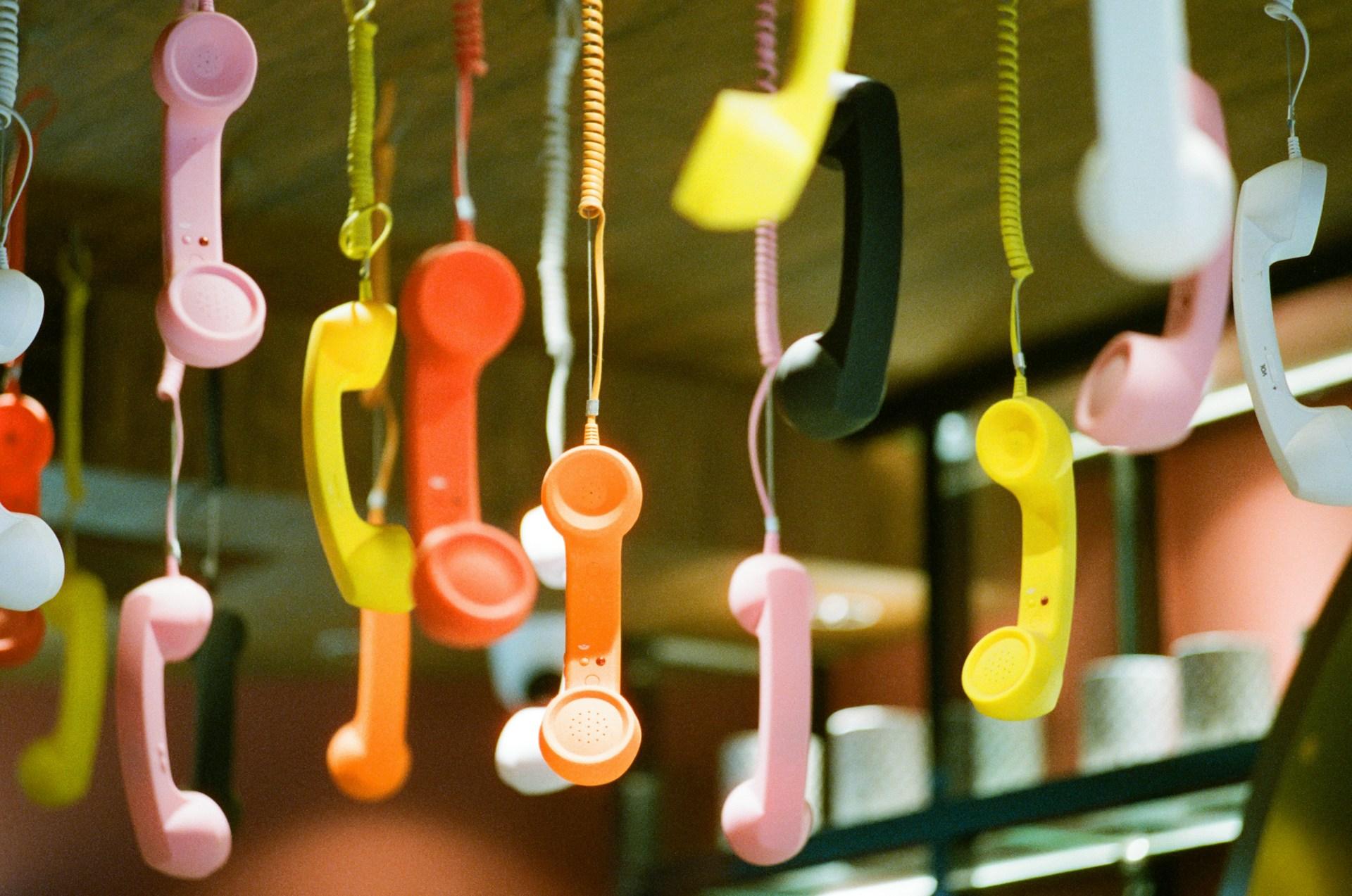 Protectaseal contact us — telephone handsets representing customer enquiry and support service