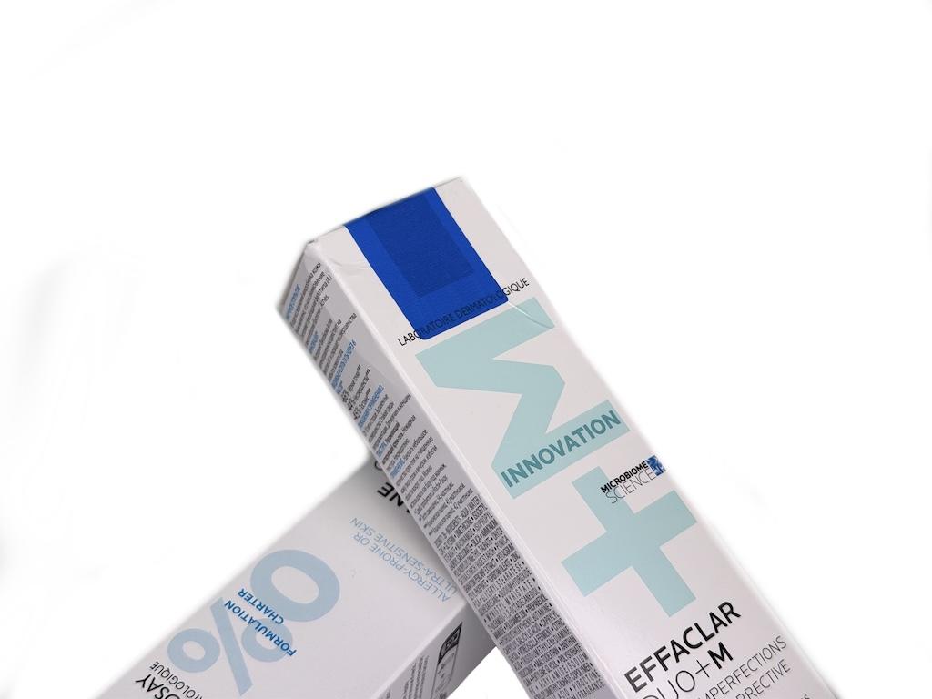 White cosmetic boxes with tamper-evident blue brand protection label for luxury packaging authentication